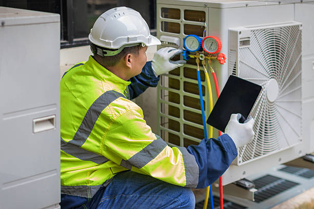 Professional Heat Pump Repair technician working in New Baltimore, MI